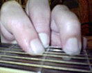 The D chord perpendicular fingers